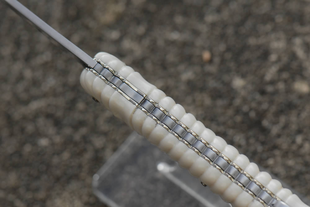 Couteau à pompe 